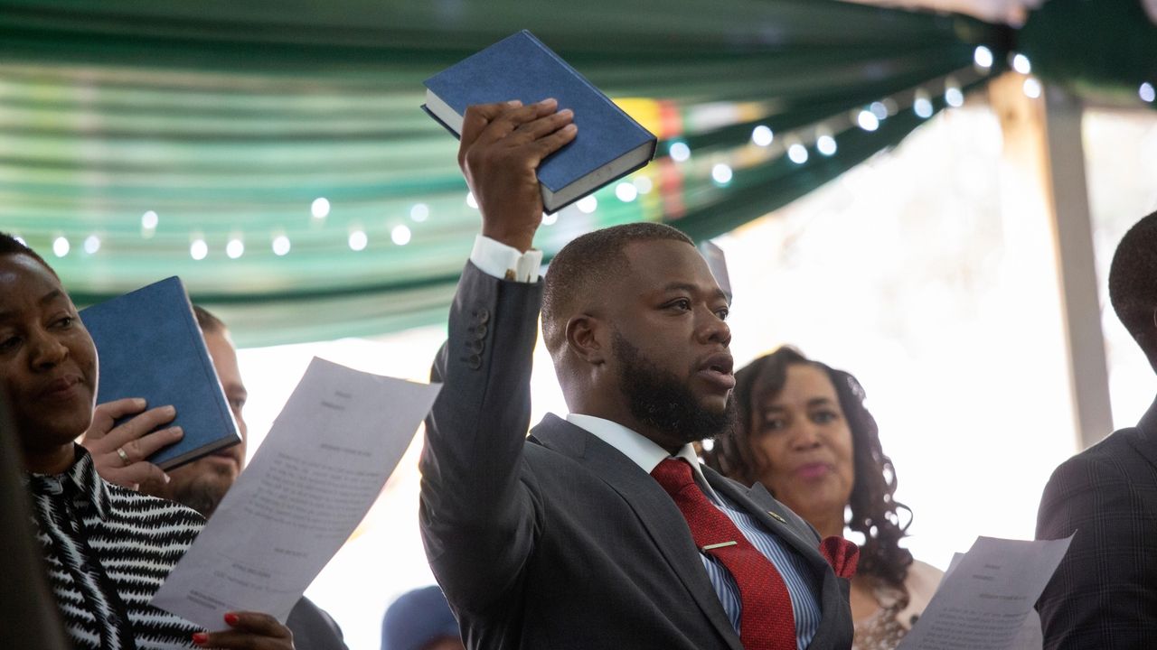 Zimbabwe's newly reelected president appoints his son and nephew to