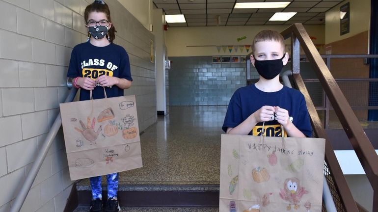 In Massapequa, fifth-graders at Lockhart Elementary School decorated brown paper...