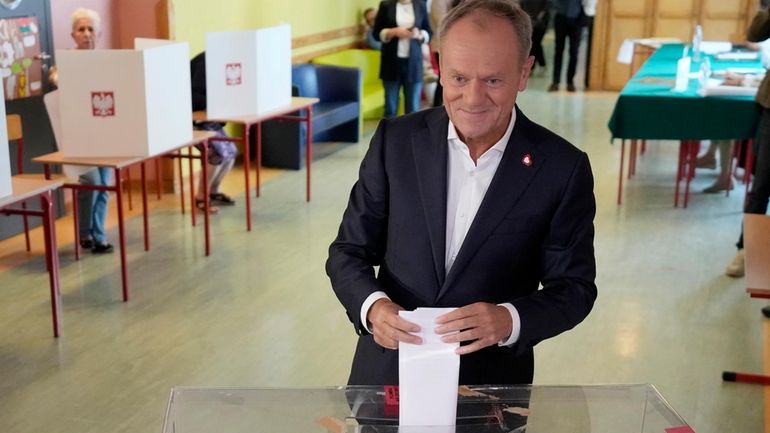 Polish Prime Minister Donald Tusk, who leads a centrist, pro-EU...