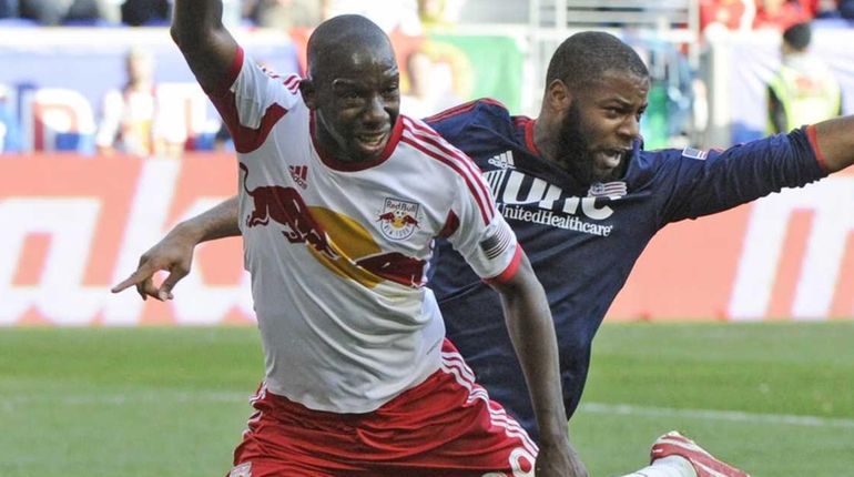 New York Red Bulls forward Bradley Wright-Phillips, left, takes the...