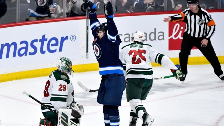 Winnipeg Jets' Gabriel Vilardi celebrates his goal against Minnesota Wild...