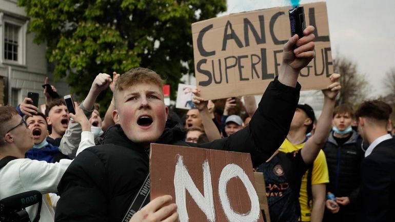 Chelsea fans protest outside Stamford Bridge stadium in London, against...