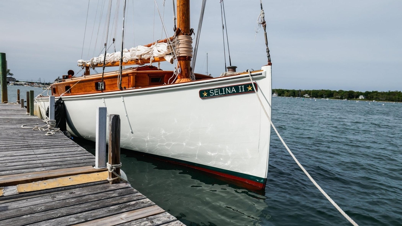 Fourth generation sets sail on 100-year-old boat - Newsday