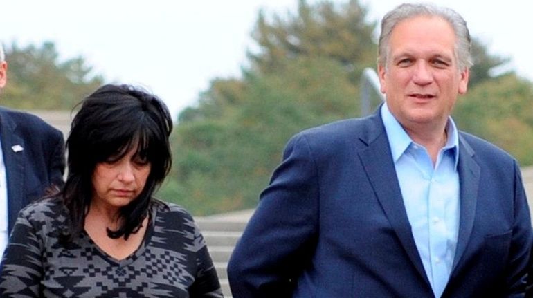 Ed and Linda Mangano, outside federal court in Central Islip...