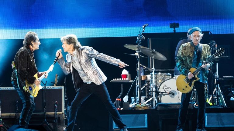 Ronnie Wood, left, Mick Jagger, and Keith Richards of the...