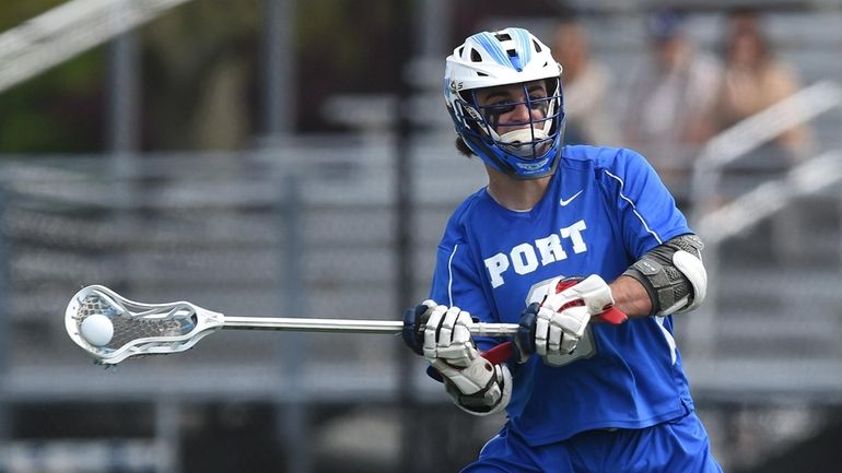 Henry Haberman #3 of Port Washington snaps off a shot...