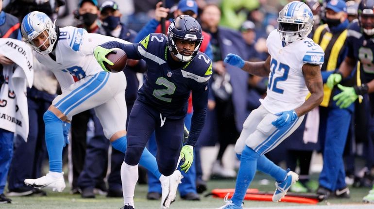 D.J. Reed #2 of the Seattle Seahawks intercepts the ball...