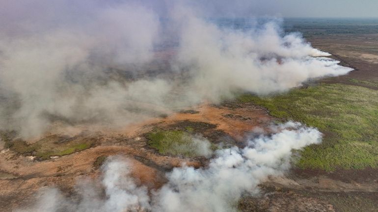 Wildfires consume an area near the Transpantaneira, also known as...