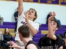 Marine scores eight points in a 47-second span to help Greenport boys hoops ice win