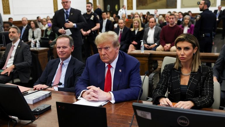 Former U.S. President Donald Trump, with lawyers Christopher Kise and...