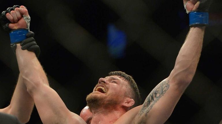 INGLEWOOD, CA - JUNE 04: Michael Bisping reacts after defeating...