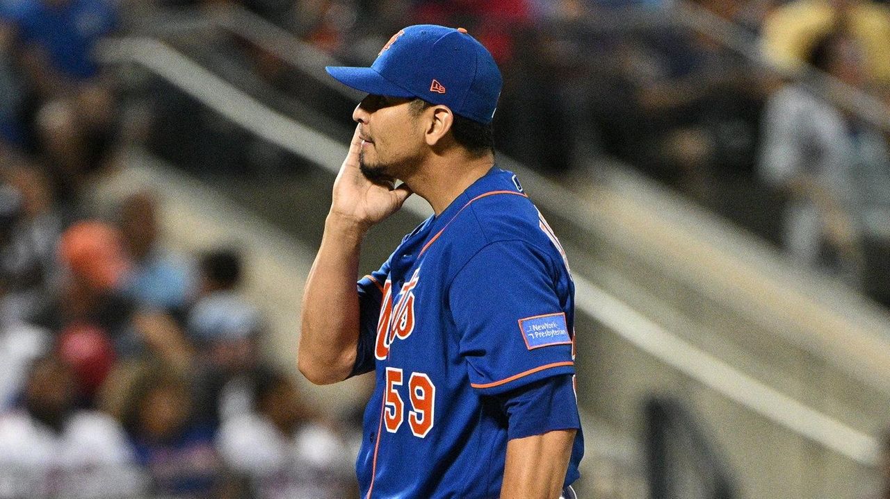 Carlos Carrasco of the New York Mets throws a pitch during the