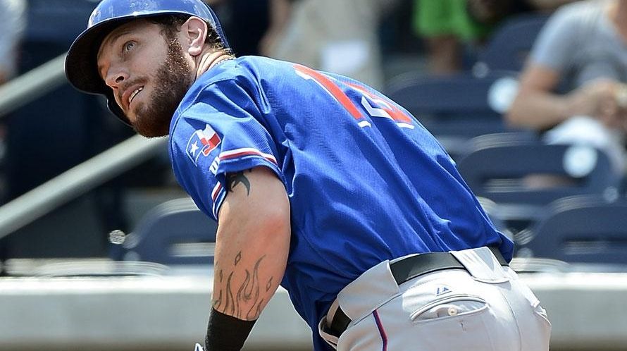 Texas Rangers' Josh Hamilton gets a single in the first inning