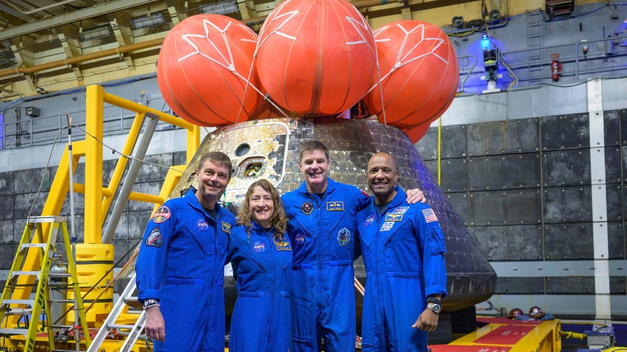 Artemis II's moon-traveling astronauts return home to cheers after a record-breaking trip