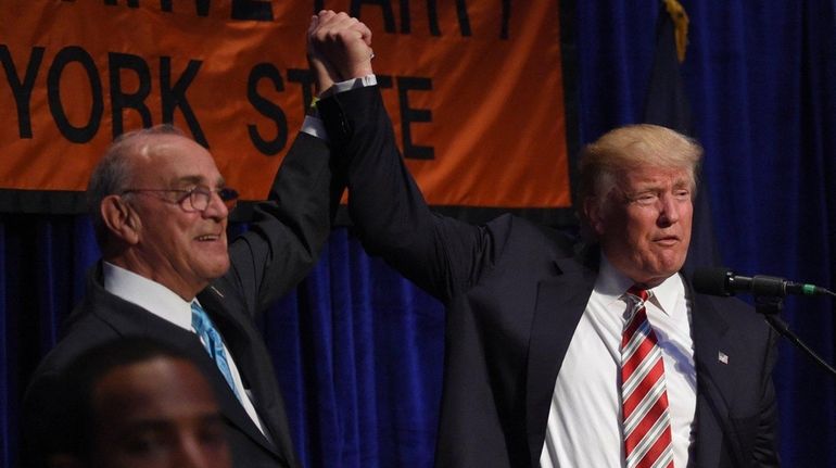 Donald Trump with New York State Conservative Party Chairman Michael...