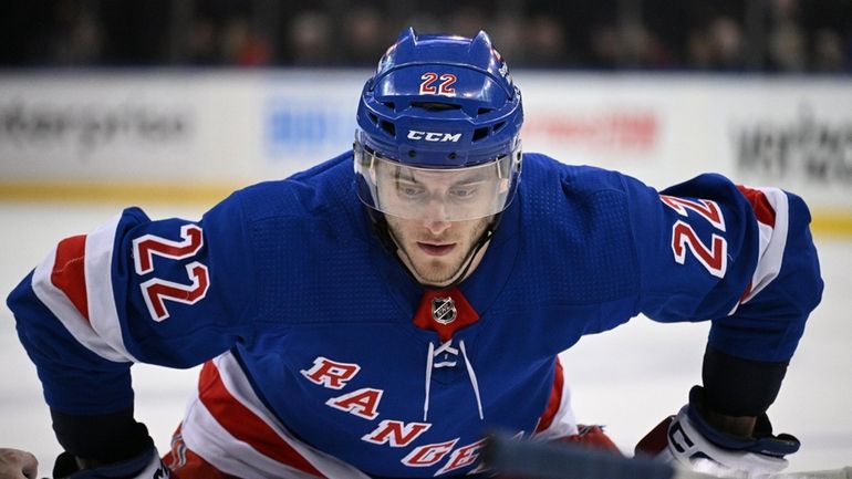 Rangers center Jonny Brodzinski sets before a faceoff against the...