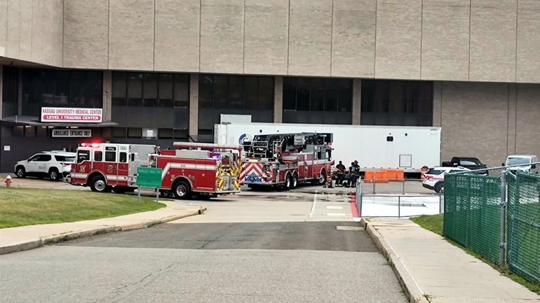 East Meadow firefighters at Nassau University Medical Center after a...