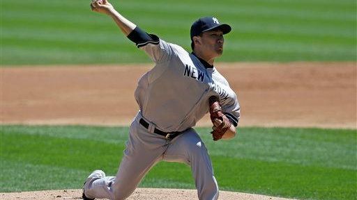 Yankees starter Masahiro Tanaka, of Japan, throws against the Chicago...