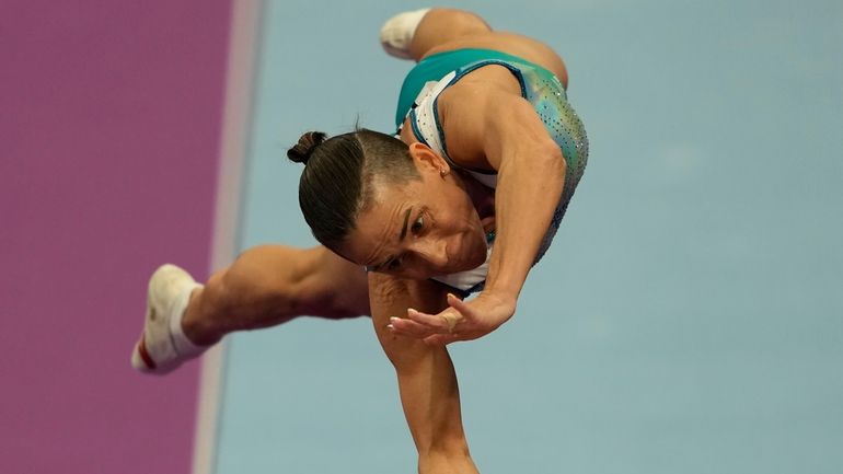 48 years old Uzbekistan's Oksana Chusovitina competes in the Artistic...