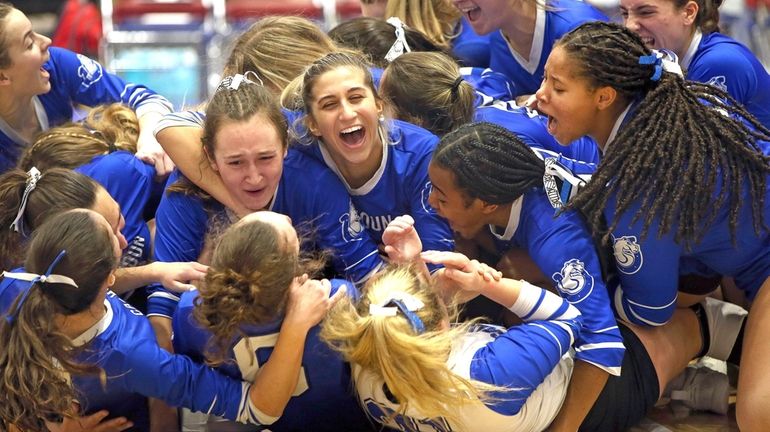 Calhoun celebrates after defeating Burnt Hills-Ballston Lake during the New York...