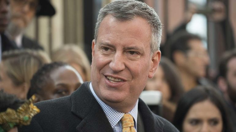 Democratic Mayoral candidate Bill de Blasio speaks to the media...