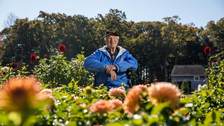 William Wolkoff, 100, at the dahlia garden he founded at...
