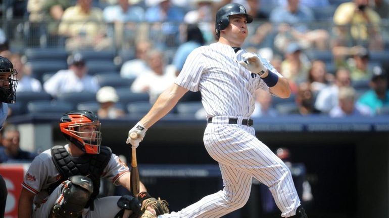 New York Yankees first baseman Mark Teixeira (25) connects for...