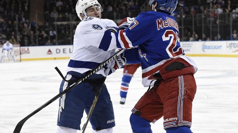 New York Rangers defenseman Ryan McDonagh and Tampa Bay Lightning...