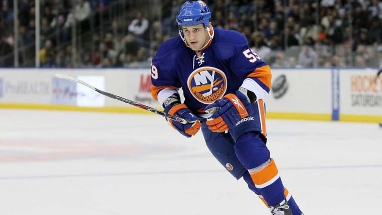 Micheal Haley of the New York Islanders skates against the...