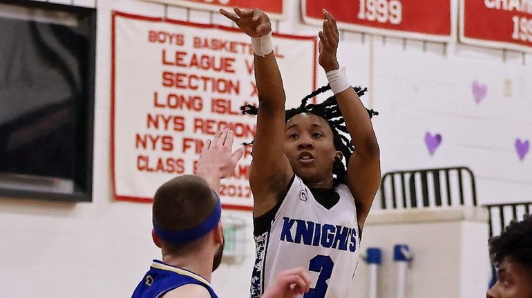 Smithtown Christian guard Nehemiah Yuen hits the three point shot...