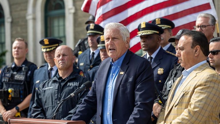 Nassau County Executive Bruce Blakeman, with Police Commissioner Patrick Ryder,...