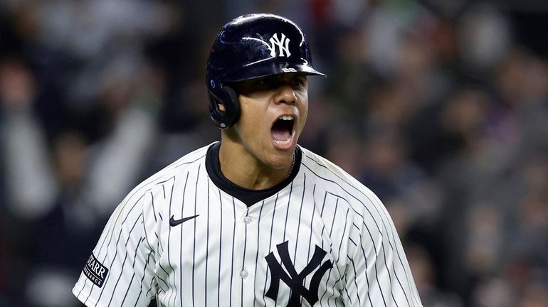 Juan Soto #22 of the Yankees reacts after his seventh...