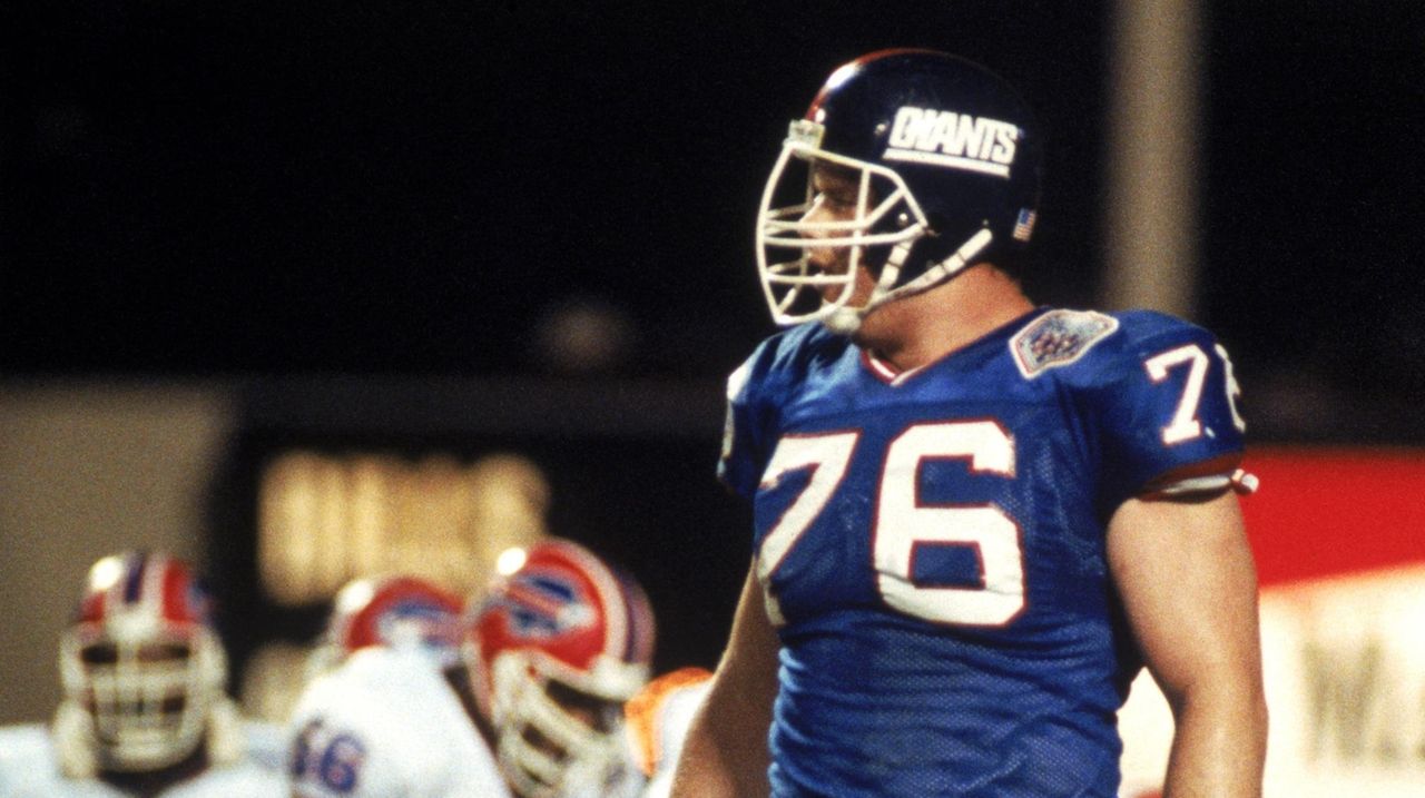 Offensive guard Eric Moore of the New York Giants looks on during a News  Photo - Getty Images