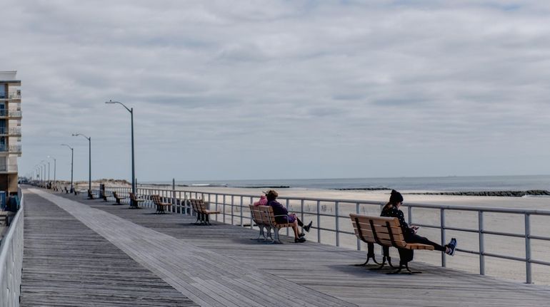 The boardwalk in Atlantic Beach comes to life in the...