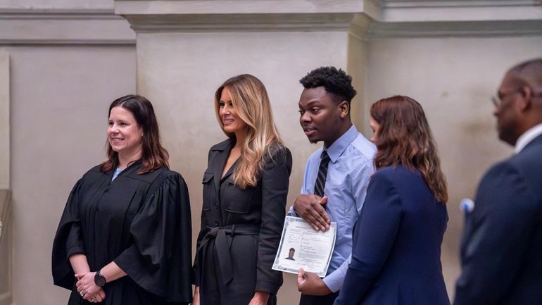 From left, Judge Elizabeth Gunn, and former first lady Melania...