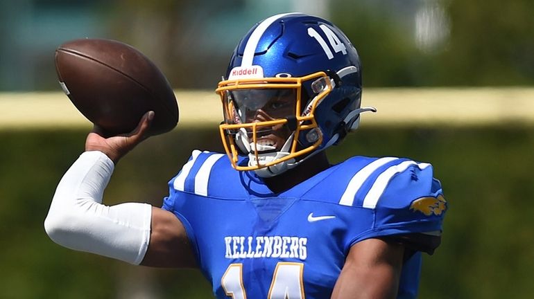 Kellenberg quarterback Devin Page throws a pass during the first quarter...