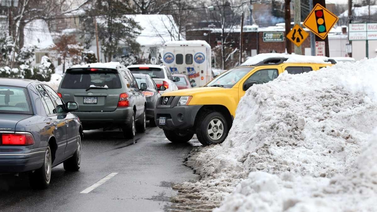 Snow piles pose hazards at intersections - Newsday
