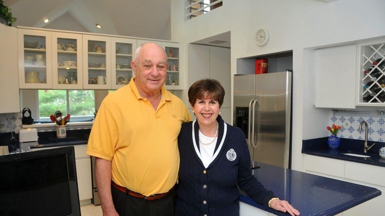 Irene and Mike Geisinger show the kitchen of the unusual...