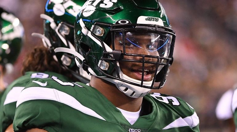 New York Jets defensive tackle Quinnen Williams looks on from...