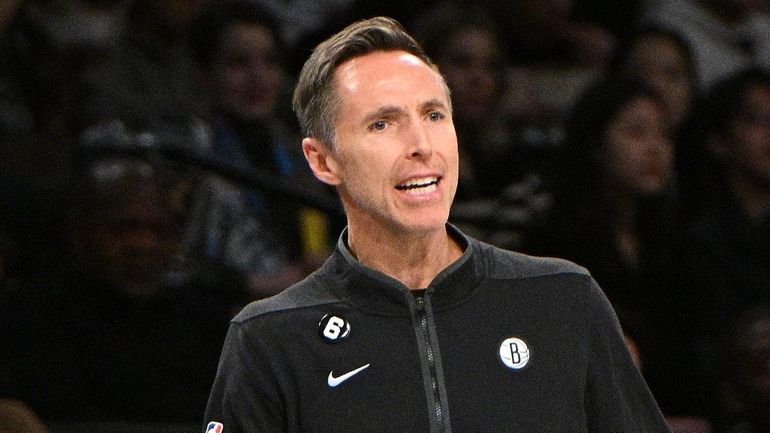 Steve Nash reacts in the first half of a basketball game at...