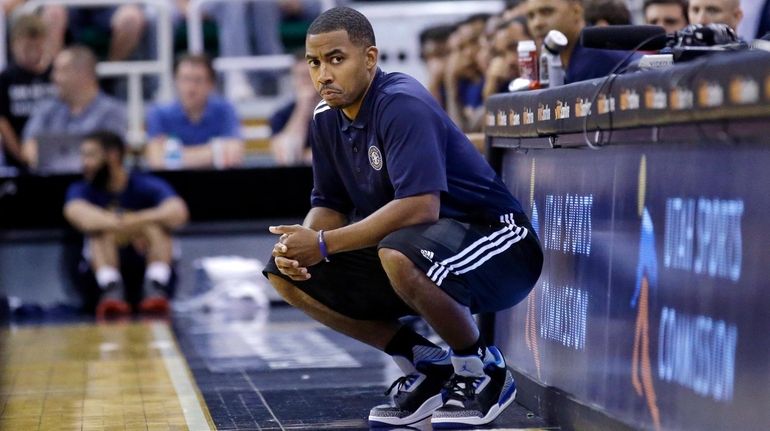 Utah Jazz coach Johnnie Bryant watches during the second half...