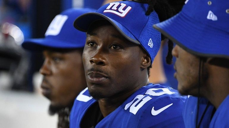 Giants cornerback Janoris Jenkins looks on from the sideline during...