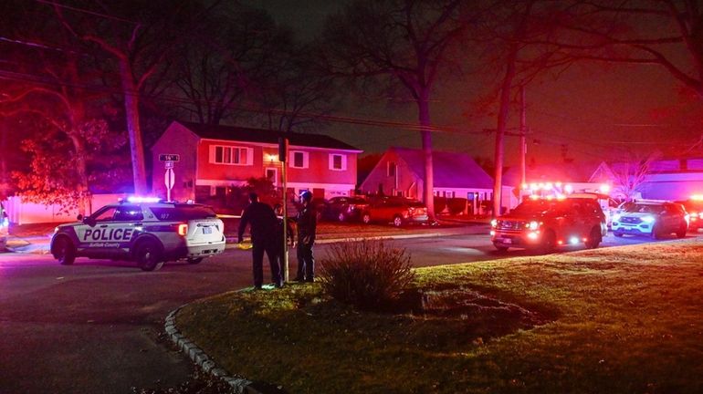 The Suffolk County police at a Lindenhurst home earlier this...