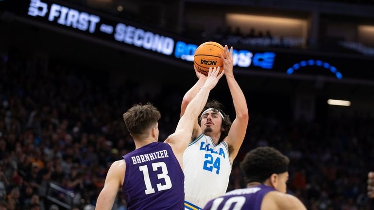 UCLA guard Jaime Jaquez Jr. (24) shoots over Northwestern guard...