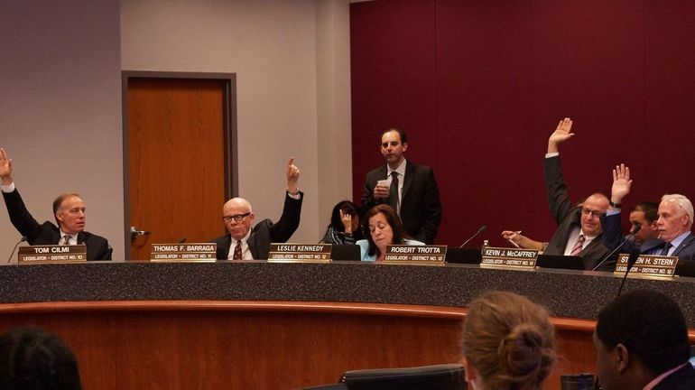 Legislators Tom Cilmi, Thomas Barraga, Robert Trotta and Kevin McCaffrey...