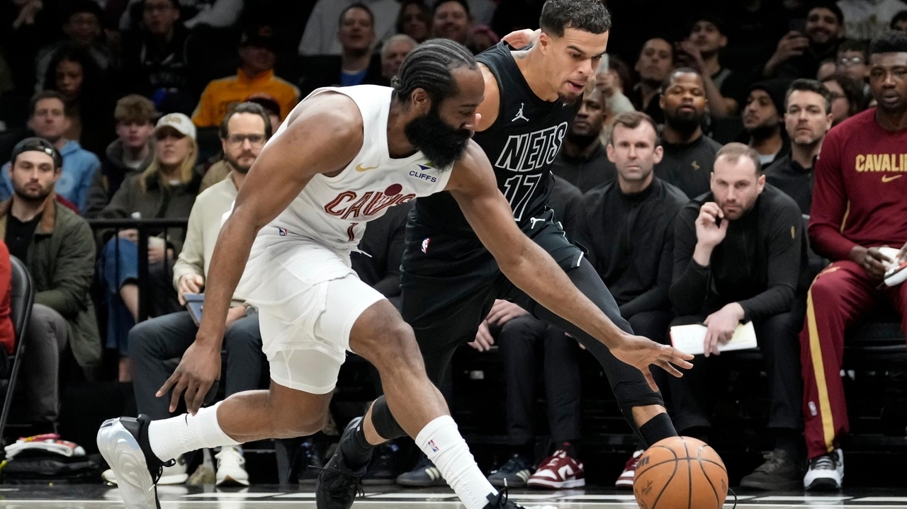 Harden scores 22 points with broken thumb, leads Cavaliers over the Nets 106-102