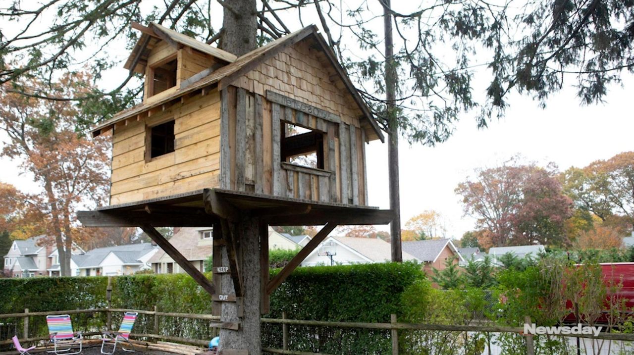 Village says man needs building permit to keep family's tree house