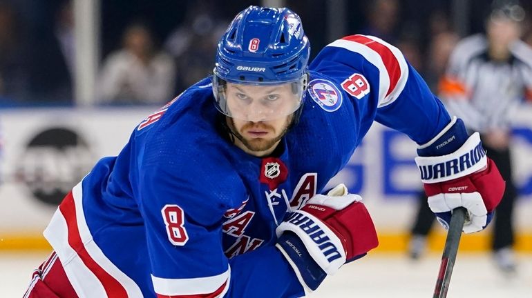 Rangers' Jacob Trouba plays during the first period of Game...