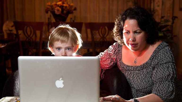 Robin Gorman Newman and her son, Seth, at home. Facebook...