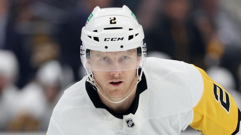 Chad Ruhwedel #2 of the Pittsburgh Penguins looks on during...